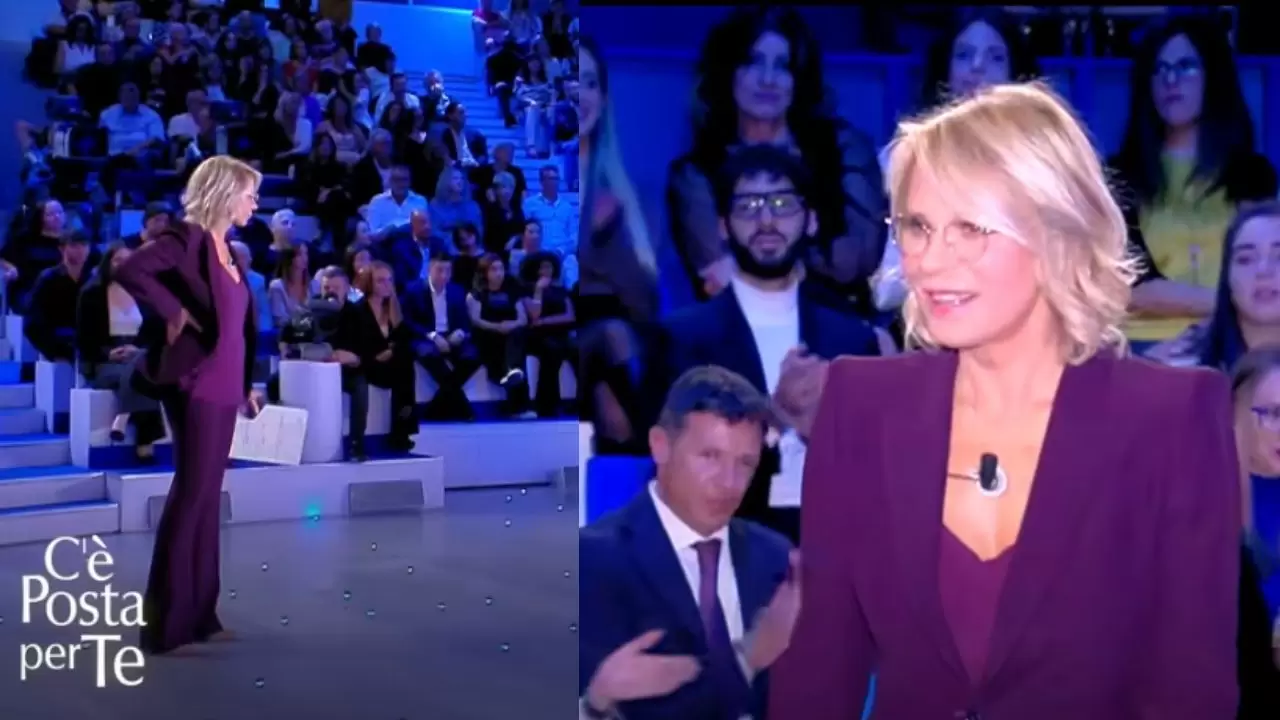 maria de filippi outfit viola a c'è posta per te 2024