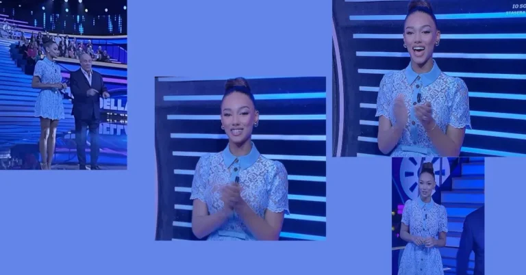 Samira Lui a La ruota della fortuna con abito corto pizzo celeste